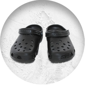 A photo of a pair of black Crocs
